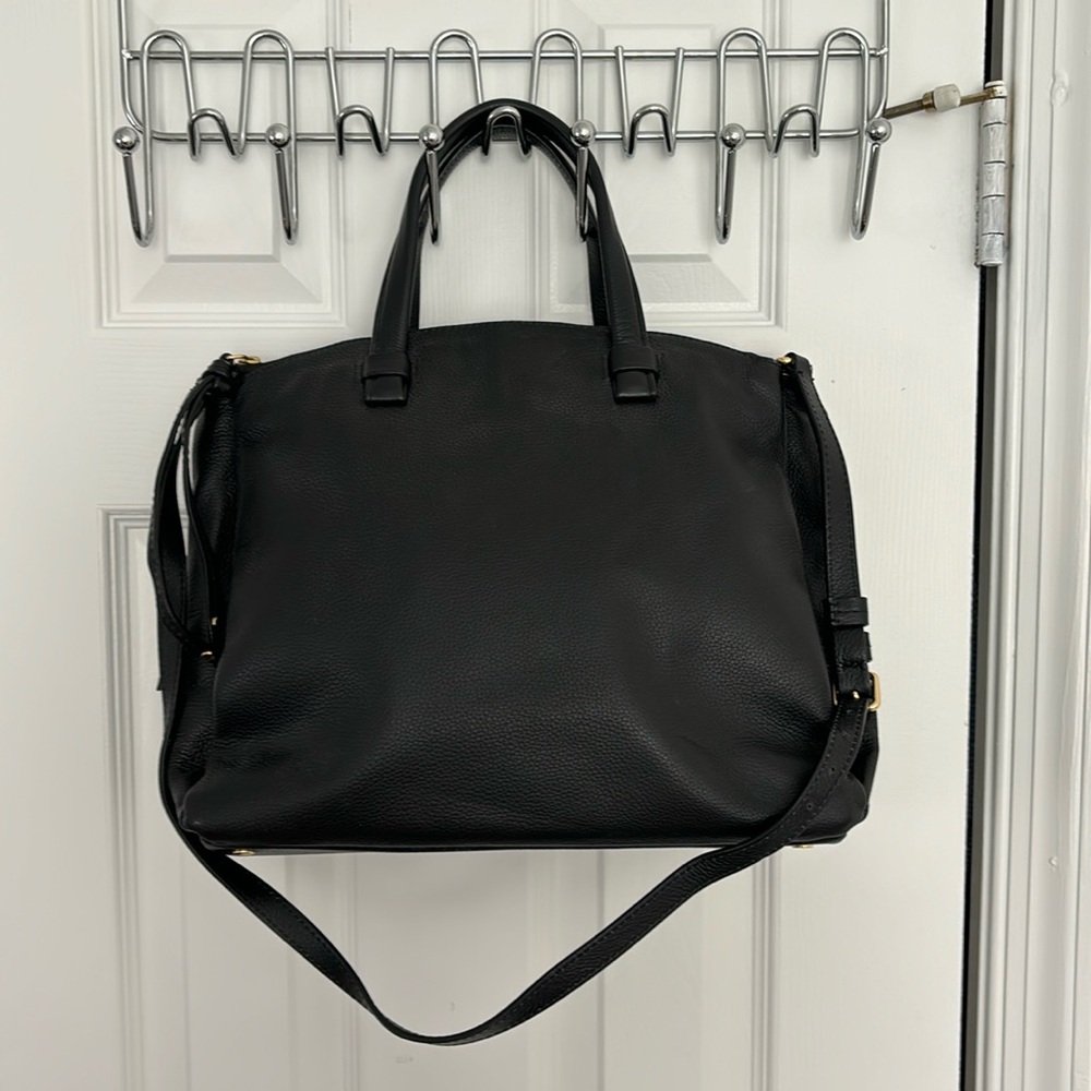 Minimalist leather tote bag with three compartments